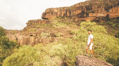 Traveller stood at Ubirr Lookout in Darwin, Australia