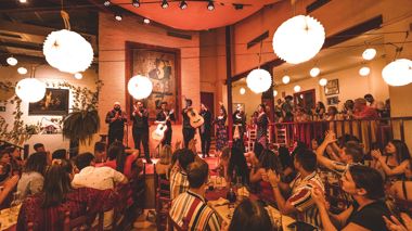 Travellers enjoying the flamenco show in Barcelona, Spain