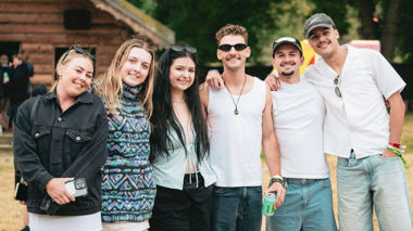 Travellers posing for a photo, Wānaka, New Zealand