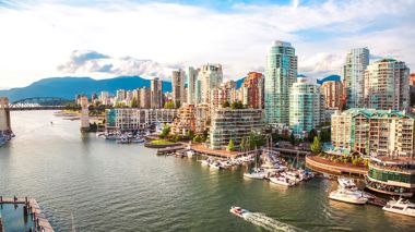 Vancouver Marina with buildings and mountains in the background