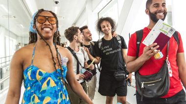 Travellers making their way to their included flight