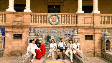 Traveller's sitting in Plaza De Seville, Spain