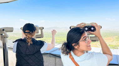 Travellers using binoculars to look out over the DMZ, South Korea