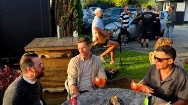 People enjoying food and drinks at an outdoor beer garden, Auckland, New Zealand