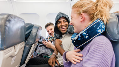 Travellers laughing on a plane, Peru