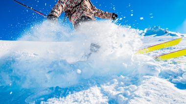Travellers Skiing Through Powdered Snow on Slopes, Queenstown, New Zealand