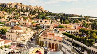 Cocktails from a roof terrace overlooking Athens, Greece.