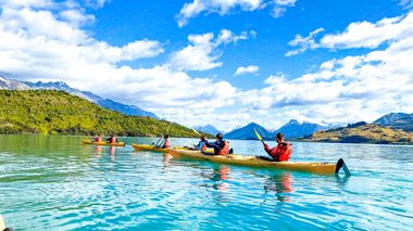 Travellers on kayaks around the Glaciers of Franz Joseph, New Zealand