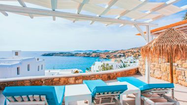 Coastal view from Paradise Beach Club in Mykonos, Greece.