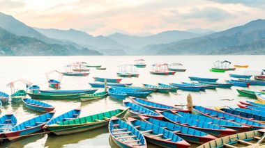 Boats on Phewa Lake in the Pokhara Valley in Nepal
