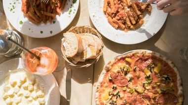 Local pizza and pasta meal in Naples, Italy
