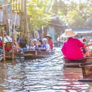 Traditional floating market on Bangkok's canals in Thailand - Contiki Bangkok to Luang Prabang Tour
