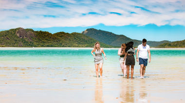 Travellers on a sail boat in the Whitsundays, Australia