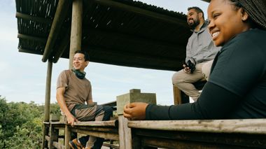 Travellers Relaxing in South African Bush, St Lucia
