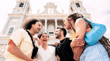 Travelers Laughing and Talking by Almudena Cathedral, Madrid, Spain