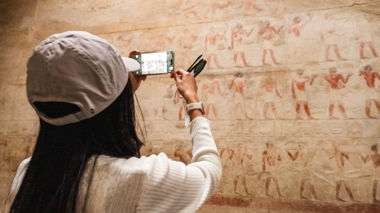 Traveller taking a picture inside the Gem in Cairo, Egypt