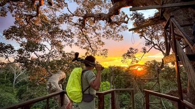 Travellers walking over a Canopy Walkway during their hike in Peru