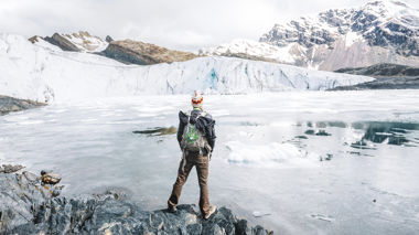 Traveller looking out over the Pastoruri Glacier in Huaraz, Peru