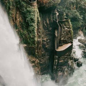 The cascading Pailón del Diablo waterfall flows through a lush canyon on the Contiki Best of Ecuador & Galapagos Islands Tour