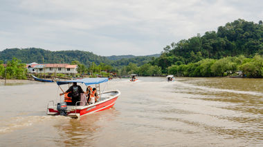 A boat going along the river to Bako National Park, Borneo, Malaysia