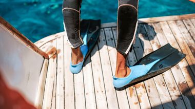 Close Up Shot of Traveller Wearing Flippers for Snorkelling, Great Barrier Reef and Cairns, Australia