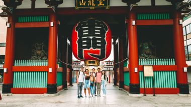Group of Travellers Stood Outside Sensoji Temple Gate, Tokyo, Japan