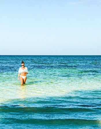 Traveller in the sea at Cancun in Mexico