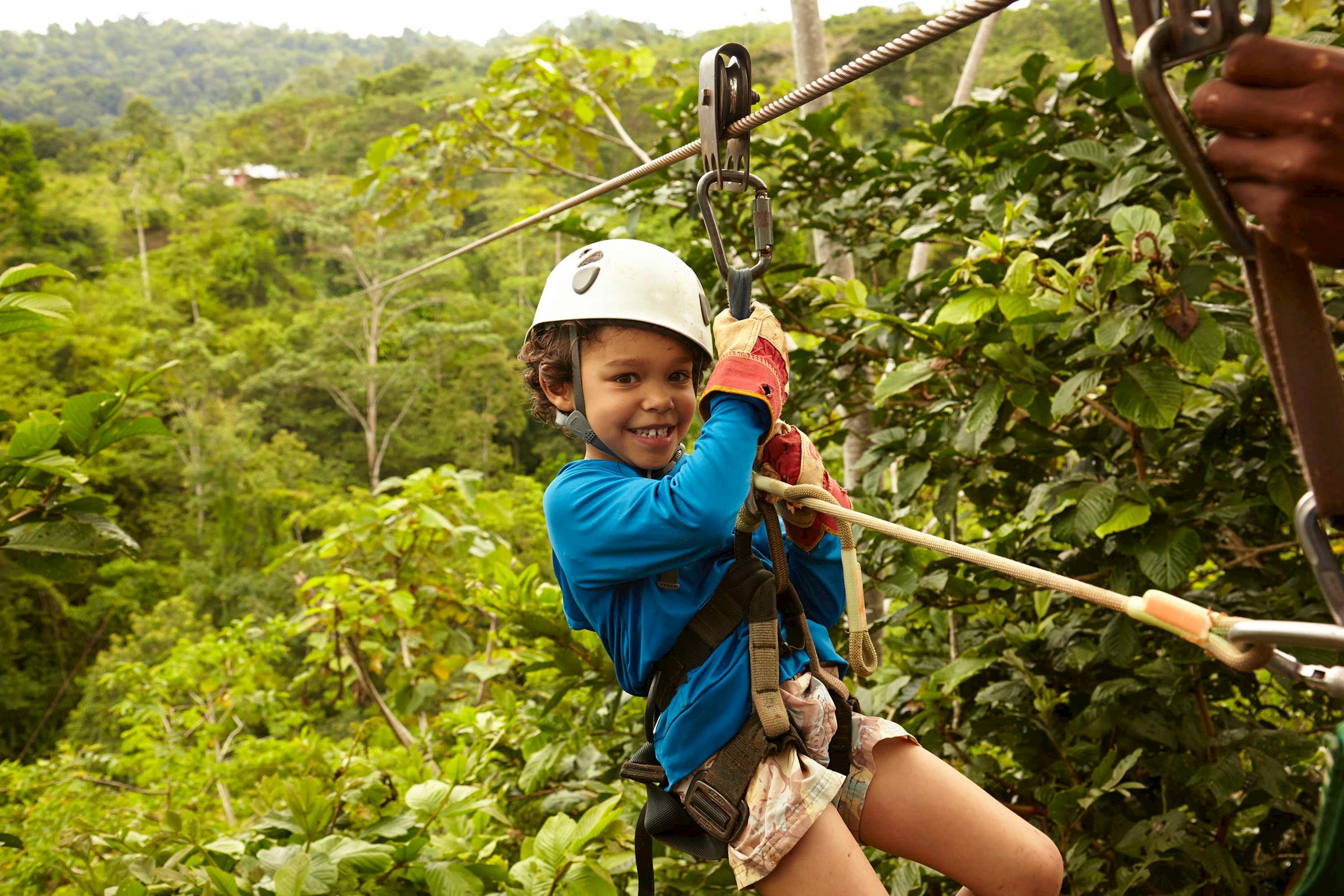 Boy Zip Lining in Arenal, Costa Rica