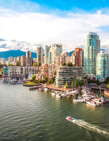 Vancouver Marina with buildings and mountains in the background