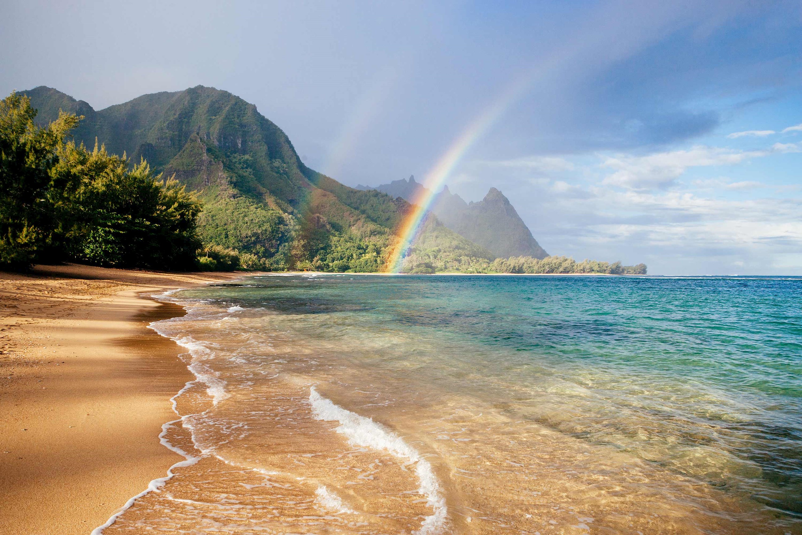 https://content1.travcorpservices.com/media/19012/take-kauai-movie-tour-adventure-visit-many-famous-film-sites-kauai-lunch-tahiti-nui-usa.jpg