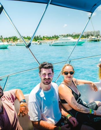 Four Travellers Relaxing on Boat in Bay, Puerto Vallarta, Mexico