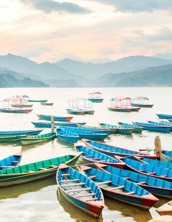 Boats on Phewa Lake in the Pokhara Valley in Nepal