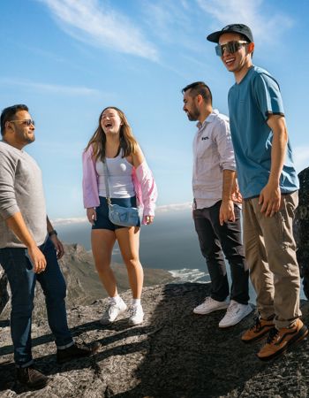 Travellers Laughing Together on Table Mountain, Cape Town, South Africa