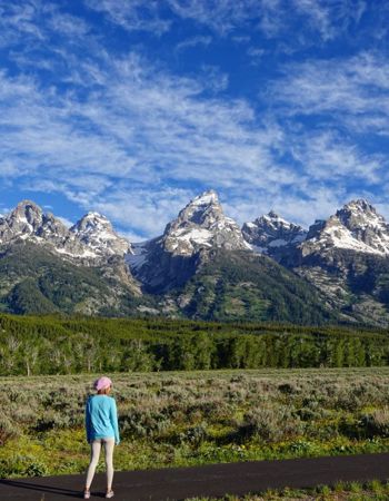 Traveller admiring the mountain range in Grand Tetons National Park